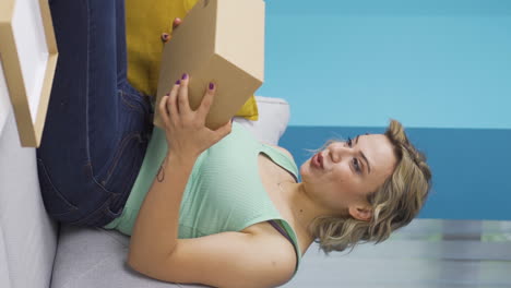 Vertical-video-of-The-woman-who-opened-the-cargo-package.